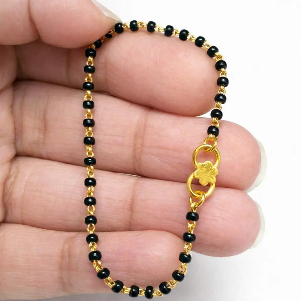 18ct Yellow Gold Baby Bracelet Black Beaded With Diamond Cut Design  Children's Gold Bracelet