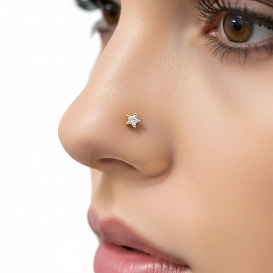Raina Jewels 22ct yellow gold star nose stud with a clear CZ stone, 3.8mm width, screw back.