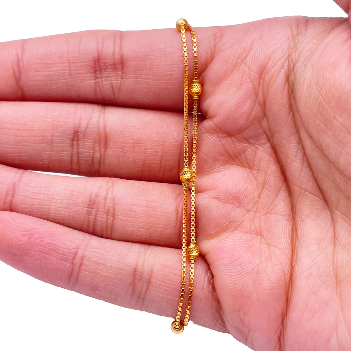 22kt gult guld dobbeltlags kæde med diamant-slebne perler armbånd