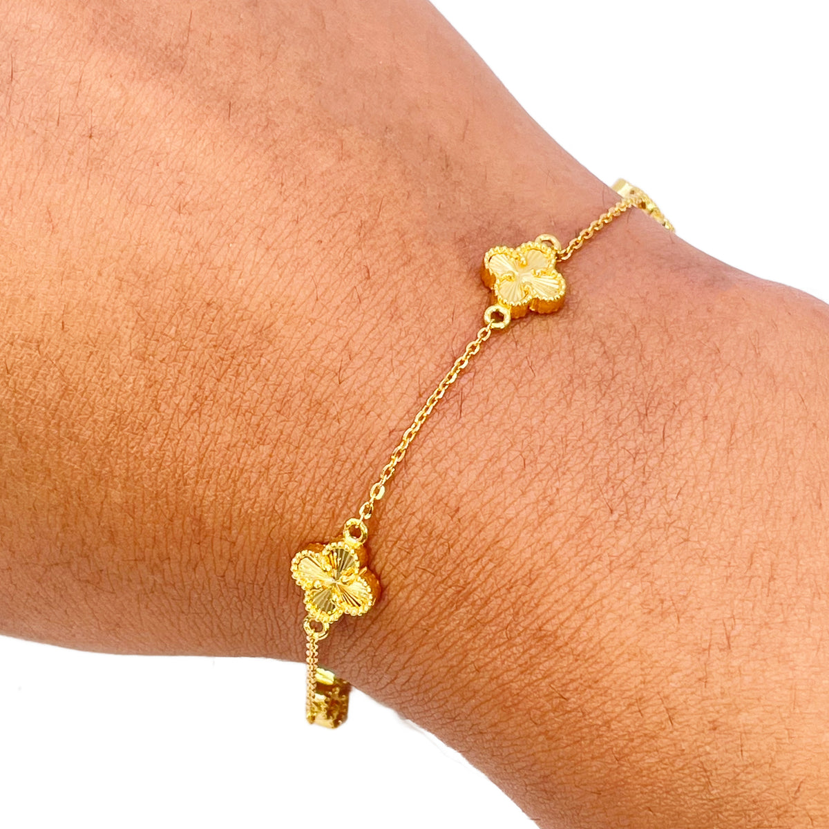 22 Karat Gelbgold Armband mit 5 Blumen-Kleeblättern und Diamantschliff, 19 cm